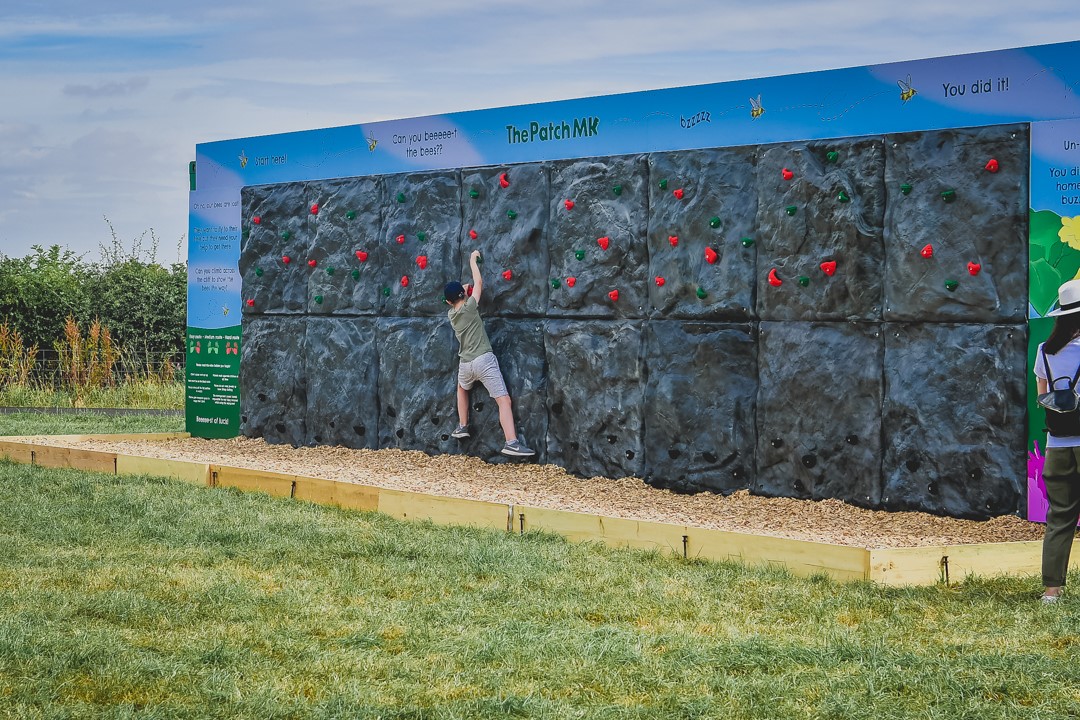 child on a climbing wall at The Patch Milton Keynes